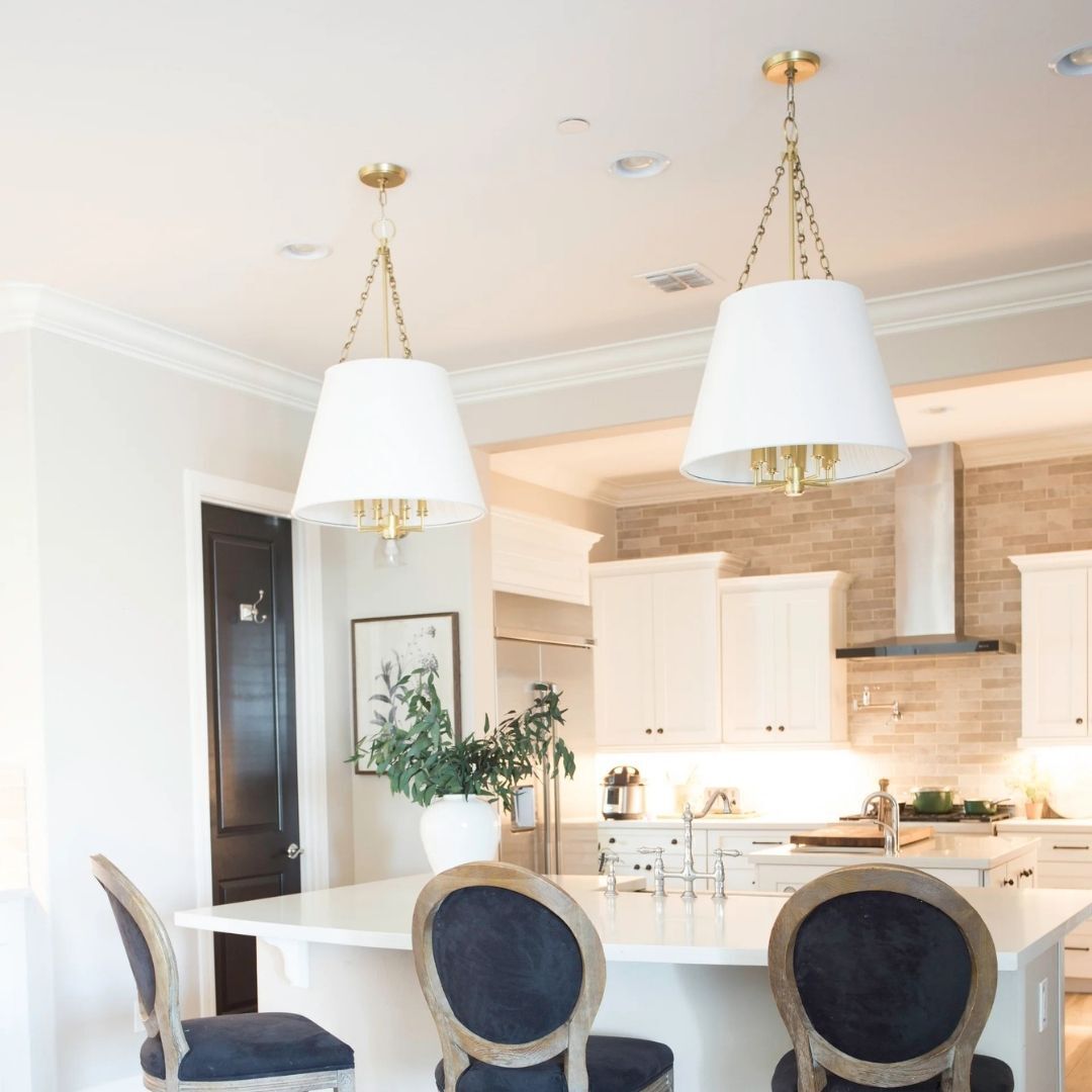 two kitchen island pendant lights and under cabinet lighting